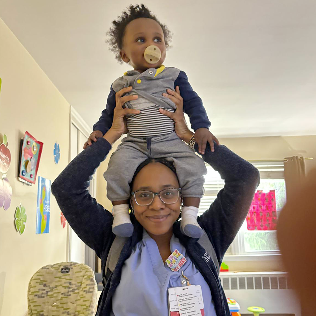 A parent and her little one in the El Elyon Bee's classroom