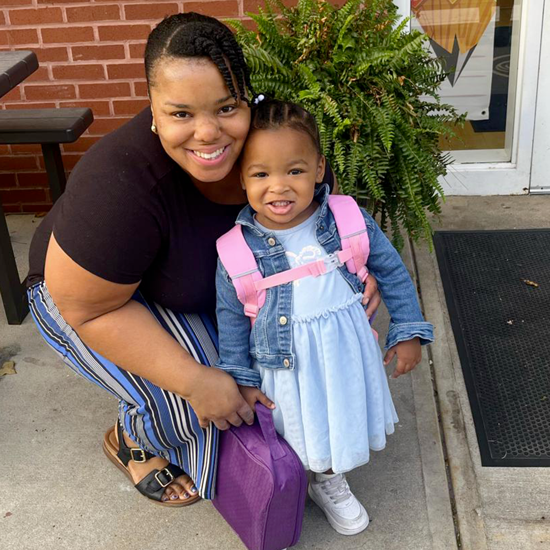 A parent and daughter ready for the day at El Elyon Bee's Daycare